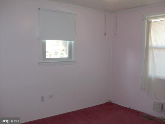 409 Circle Road Riva, MD 21140 - Photo 14 of 18 an empty room with a window