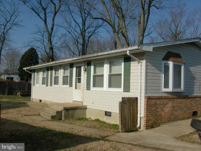 409 Circle Road Riva, MD 21140 - Photo 18 of 18 a front view of a house with garden