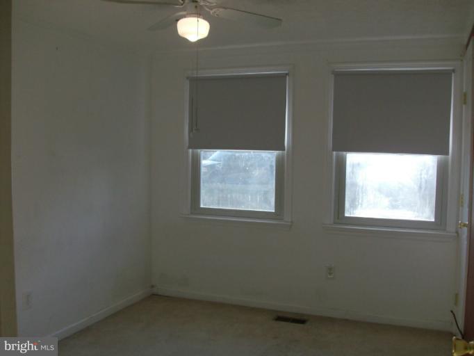 409 Circle Road Riva, MD 21140 - Photo 9 of 18 an empty room with a window