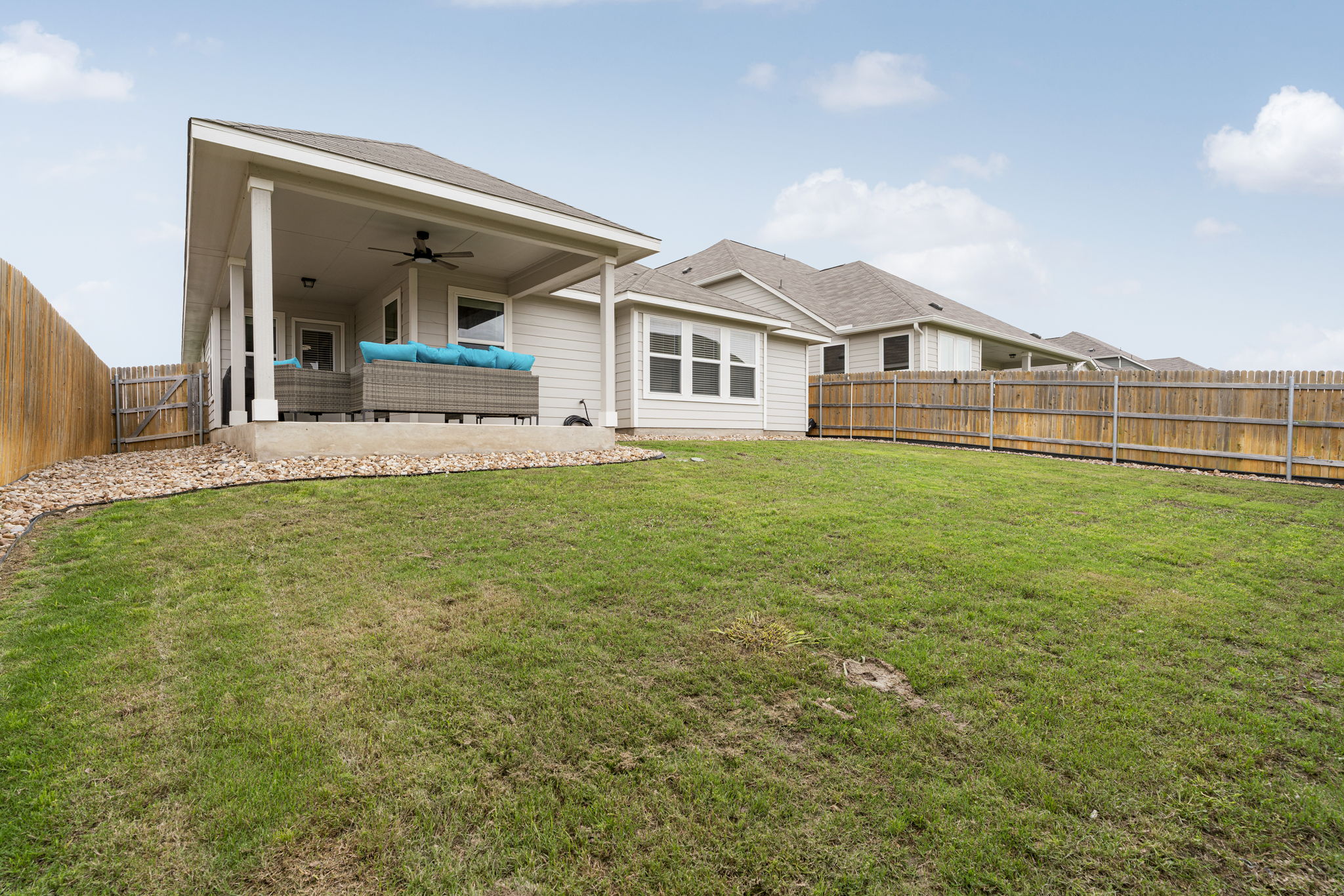 19412 Forman Drive Pflugerville, TX 78660 - Photo 29 of 34 The fully fenced backyard provides privacy and plenty of room for outdoor activities.