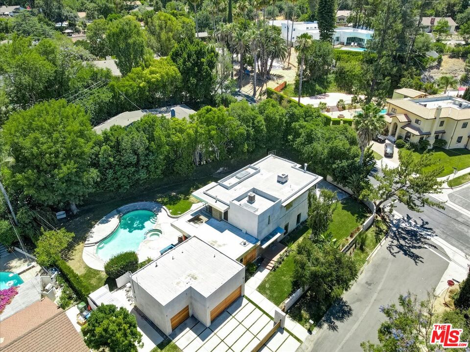 18084 Rancho Street Encino, CA 91316 - Photo 2 of 45 an aerial view of a house with a yard basket ball court and outdoor seating
