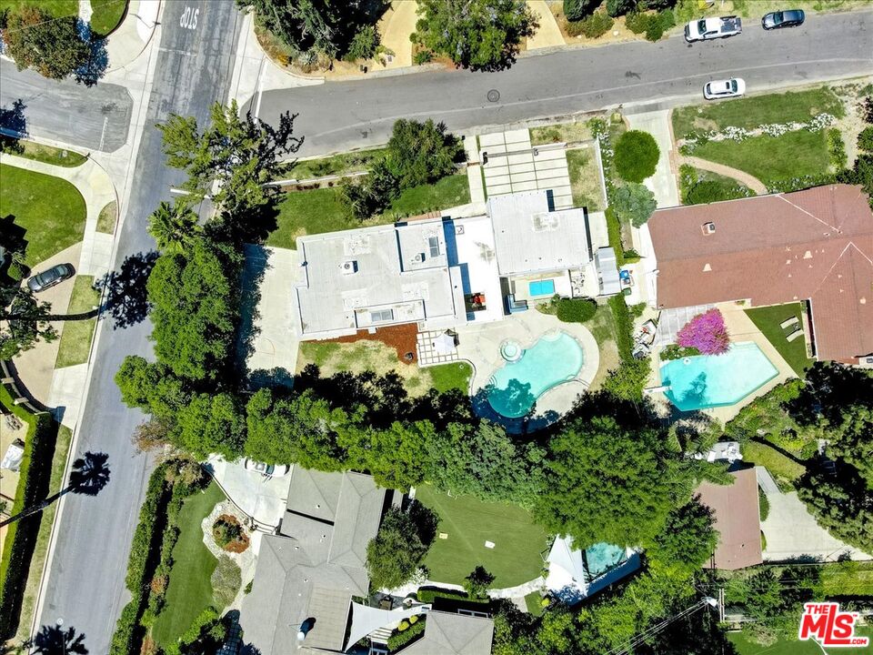 18084 Rancho Street Encino, CA 91316 - Photo 43 of 45 an aerial view of residential house with outdoor space and swimming pool