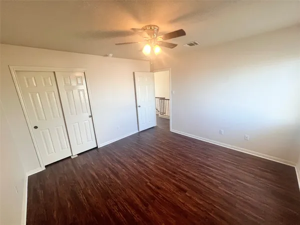 a view of a livingroom with wooden floor