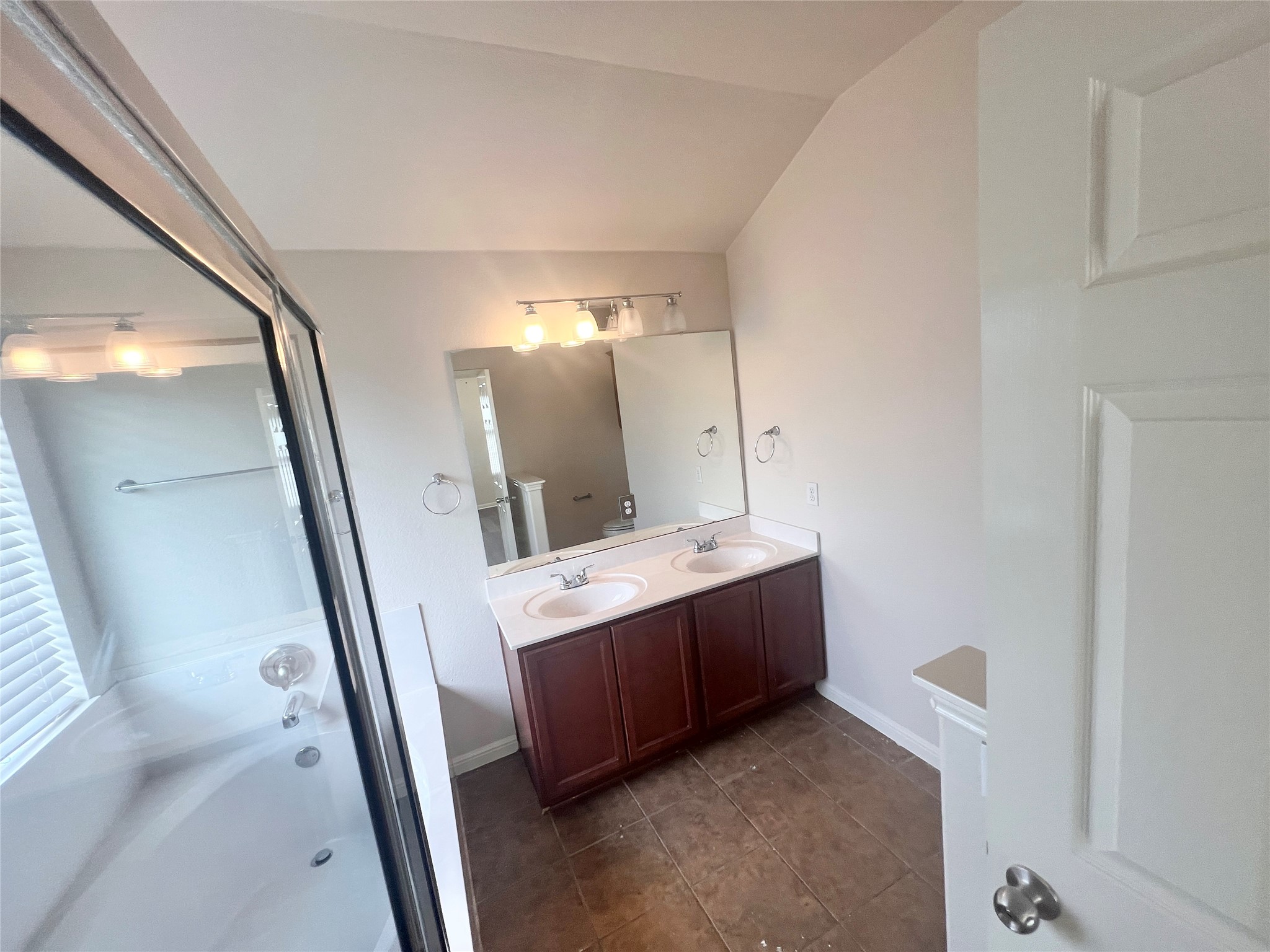 476 Nottingham Loop Kyle, TX 78640 - Photo 22 of 29 a view of bathroom with mirror and sink