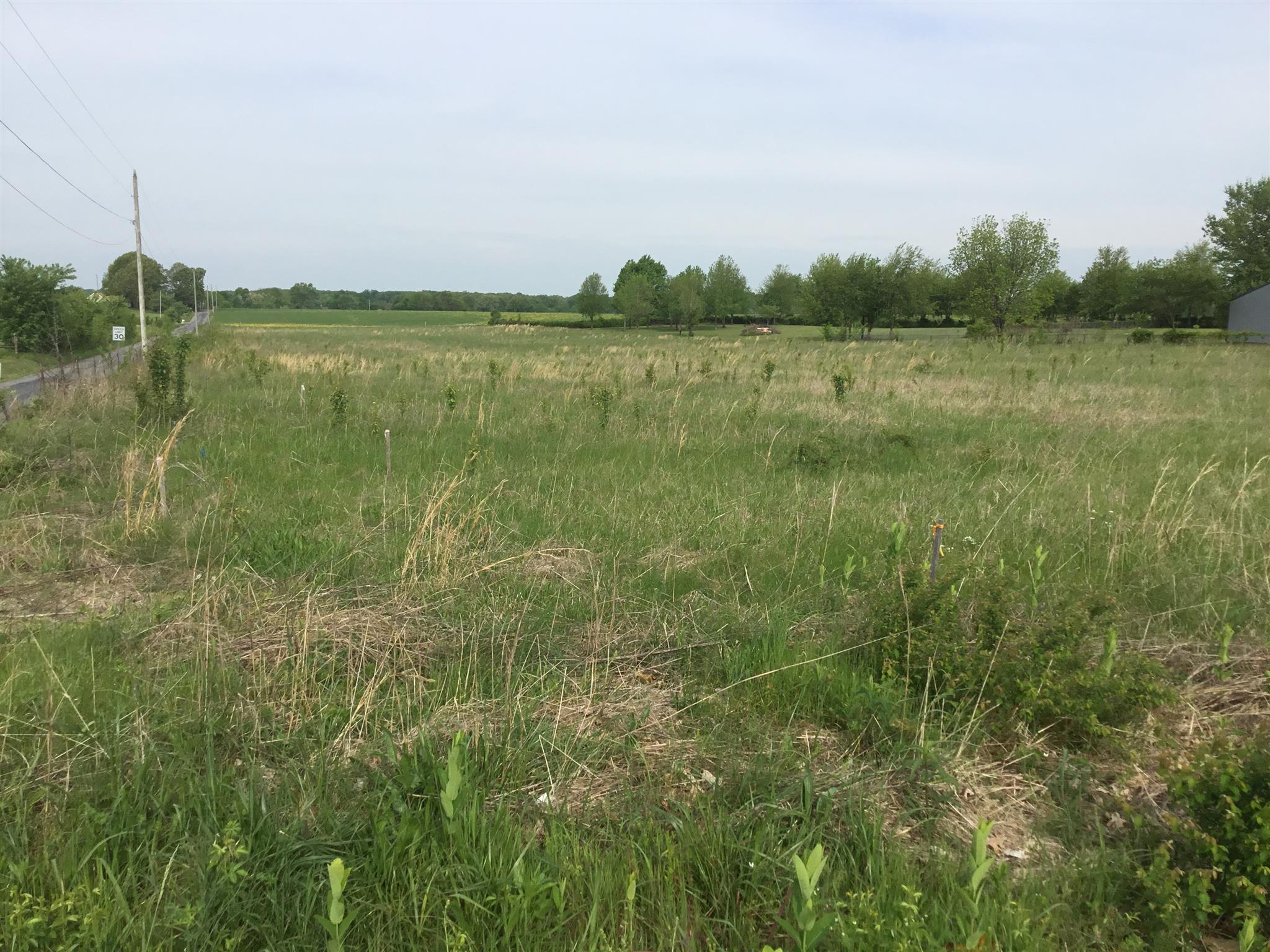 Nice level Building Lot! Bring your builder or use one of ours.