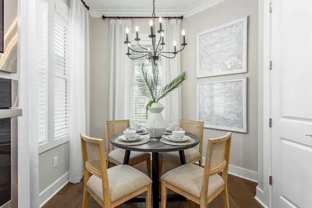 a view of a dining room with furniture window and outside view