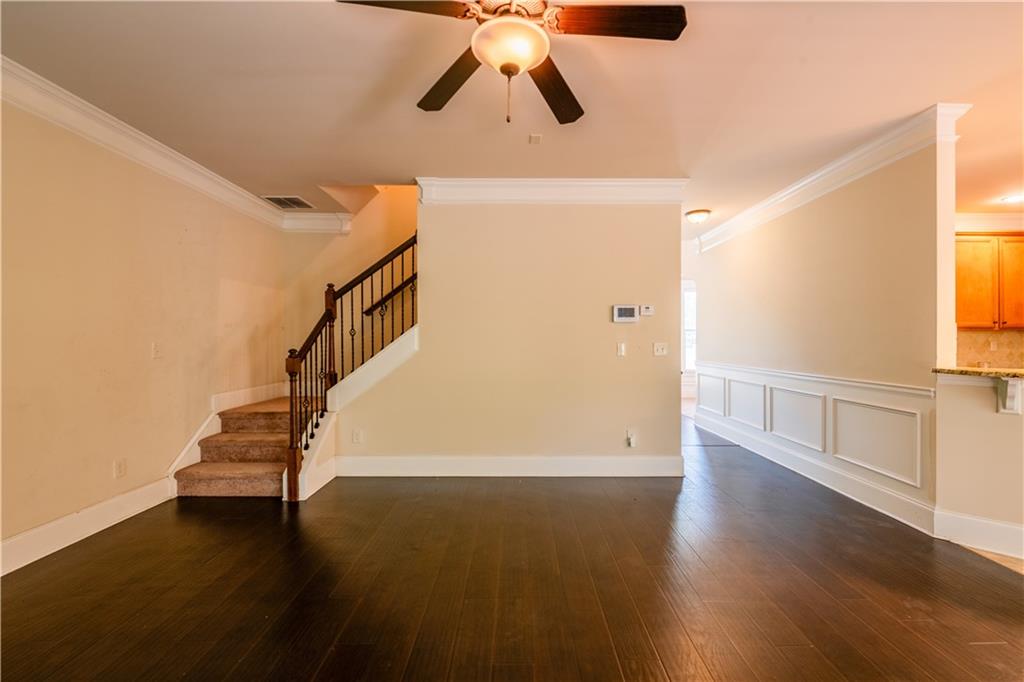 1412 Turnbridge Walk Hampton, GA 30228 - Photo 16 of 40 a view of entryway and hall with wooden floor