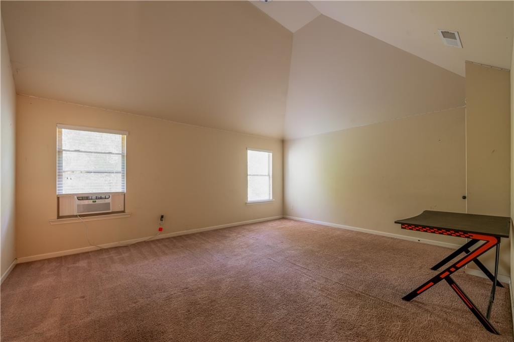 1412 Turnbridge Walk Hampton, GA 30228 - Photo 28 of 40 a view of an empty room and a window