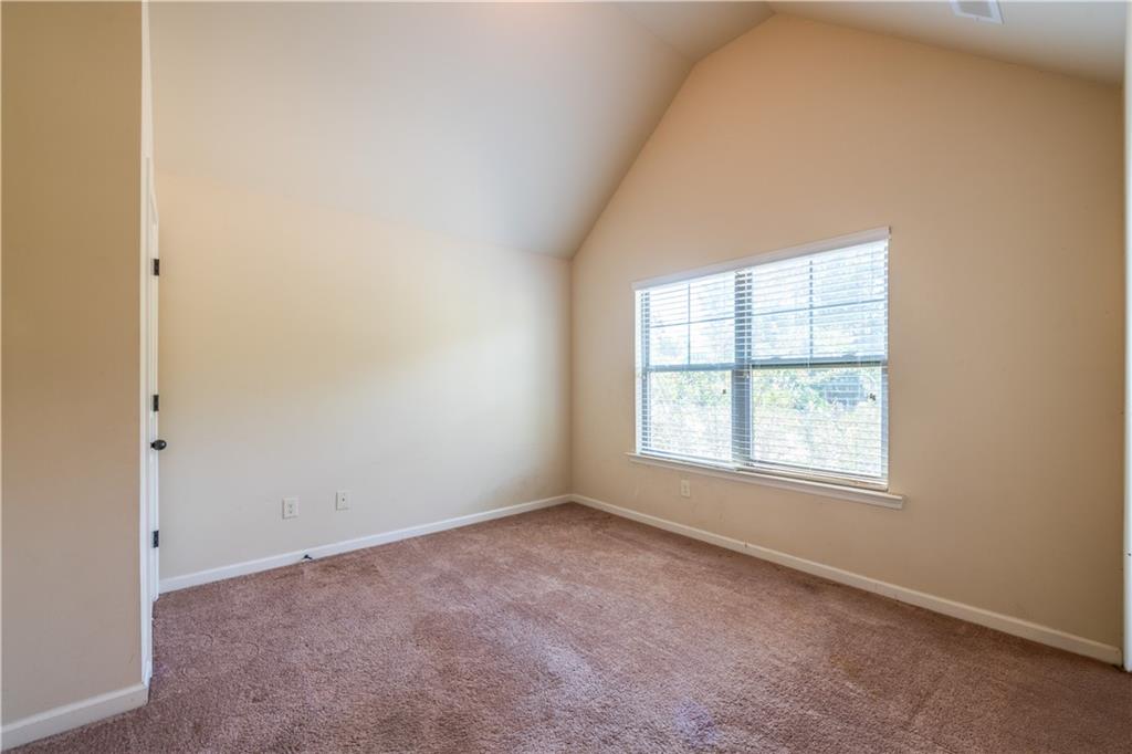 1412 Turnbridge Walk Hampton, GA 30228 - Photo 30 of 40 an empty room with a window
