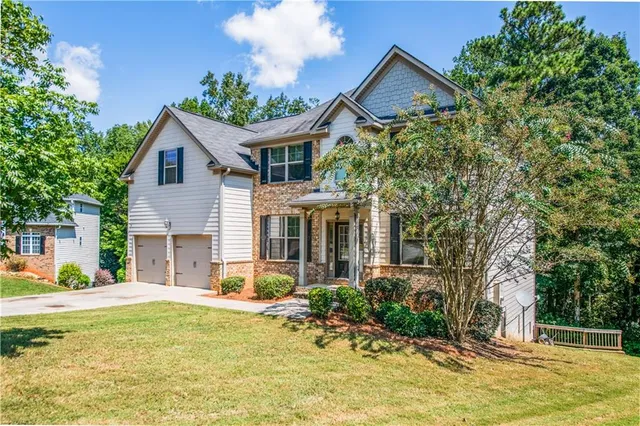 a house view with a garden space
