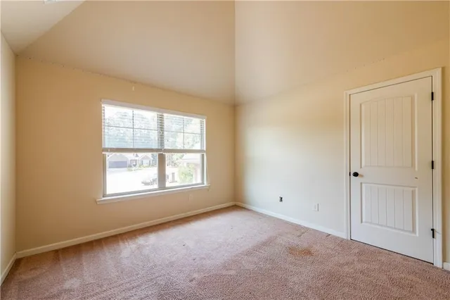 a view of a bathroom from a hallway