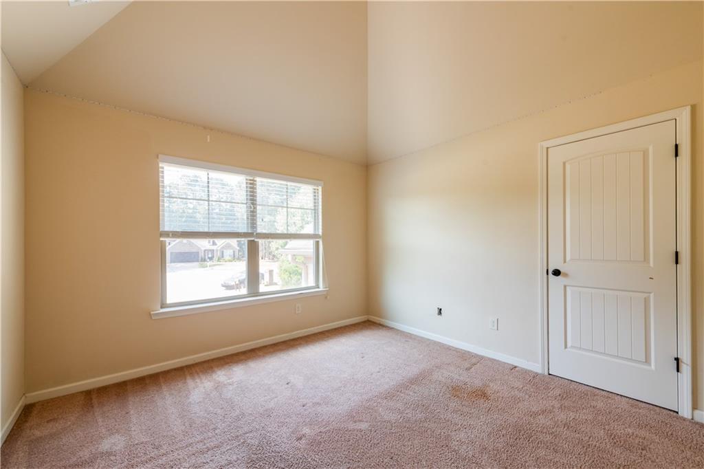 1412 Turnbridge Walk Hampton, GA 30228 - Photo 32 of 40 an empty room with a window