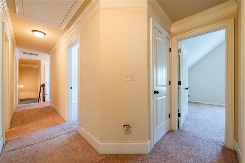 1412 Turnbridge Walk Hampton, GA 30228 - Photo 35 of 40 a view of a bathroom from a hallway