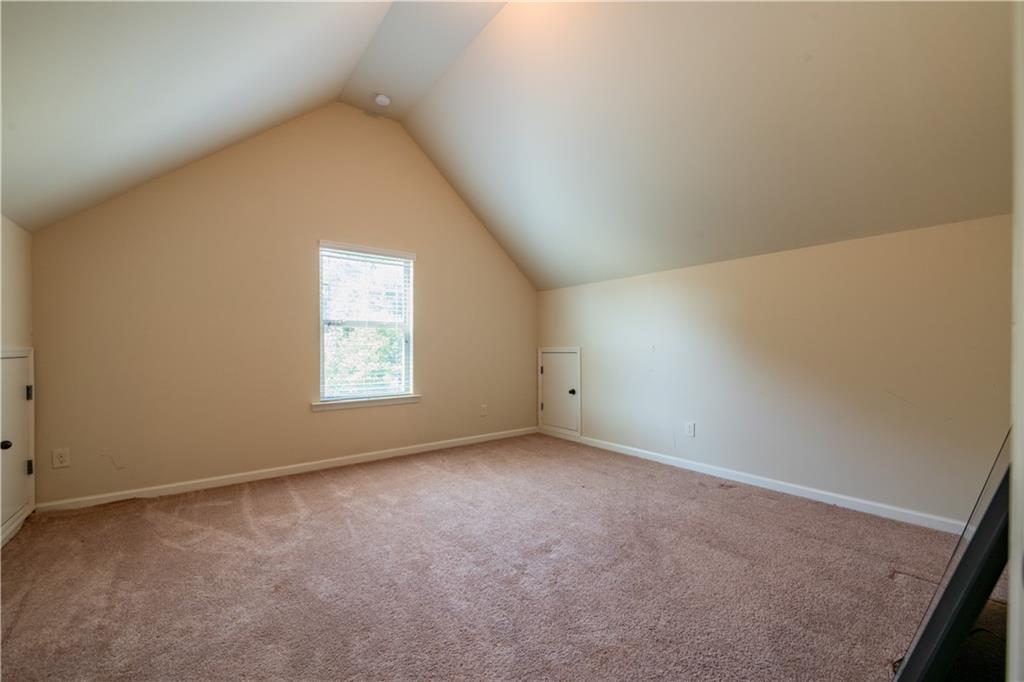 1412 Turnbridge Walk Hampton, GA 30228 - Photo 36 of 40 an empty room with a window