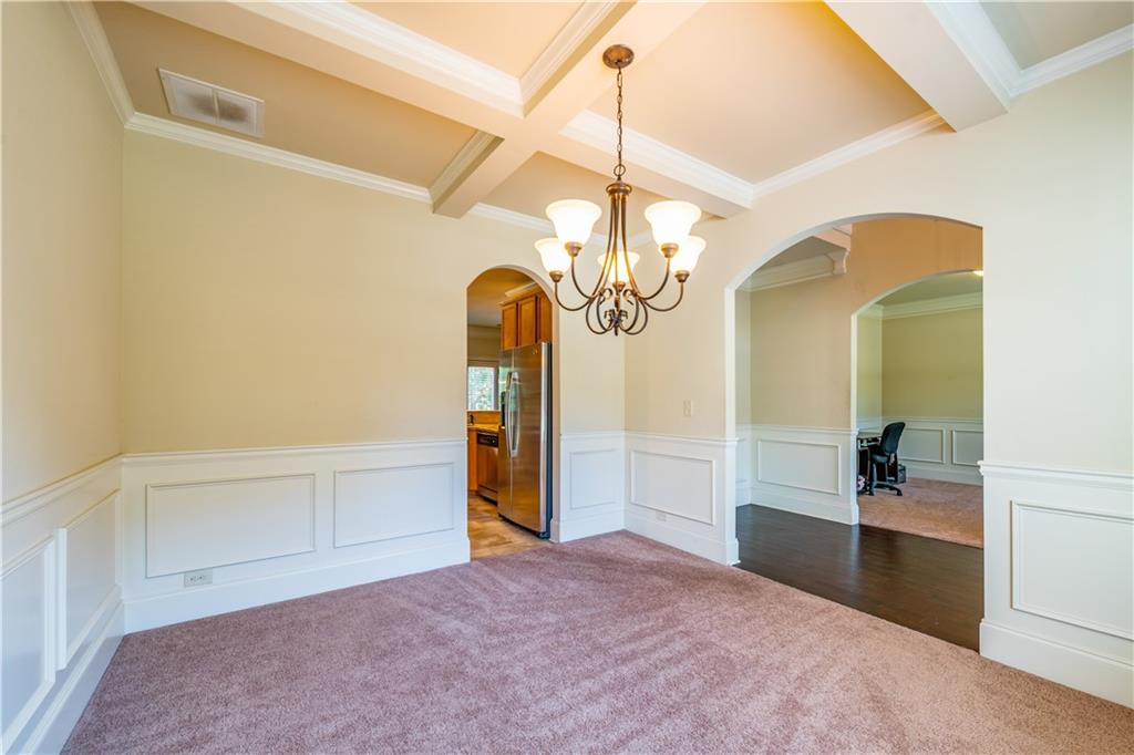 1412 Turnbridge Walk Hampton, GA 30228 - Photo 7 of 40 a view of a chandelier in a room