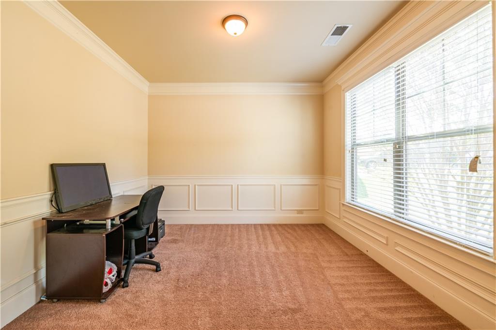 1412 Turnbridge Walk Hampton, GA 30228 - Photo 8 of 40 a view of workspace with a window