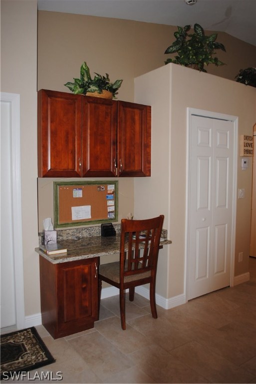 5891 Tarpon Road Bokeelia, FL 33922 - Photo 13 of 25 a kitchen with stainless steel appliances granite countertop a stove a sink and a microwave