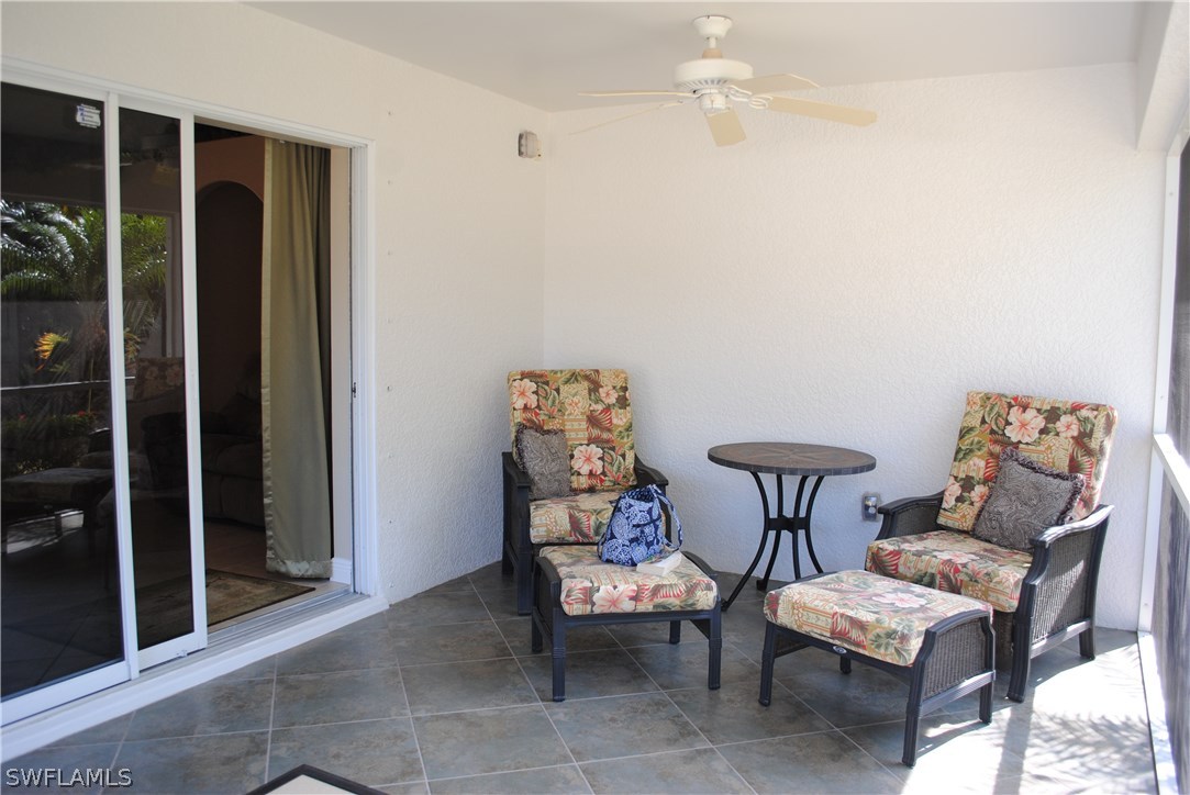 5891 Tarpon Road Bokeelia, FL 33922 - Photo 16 of 25 a view of a livingroom with furniture and a potted plant