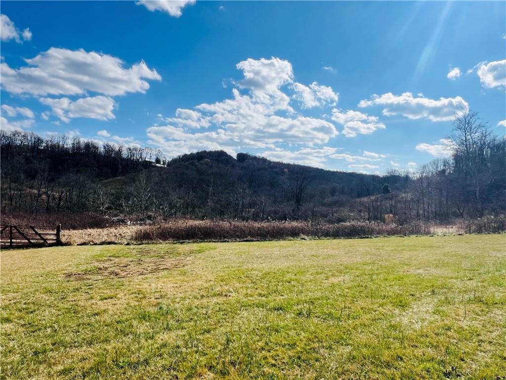 523 Highway 31 Ruffs Dale, PA 15679 - Photo 8 of 45 a view of a swimming pool with an ocean view