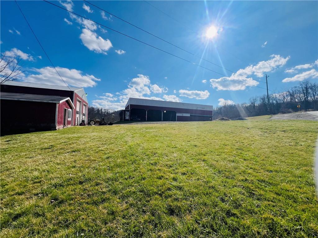 523 Highway 31 Ruffs Dale, PA 15679 - Photo 10 of 45 a view of a house with a yard