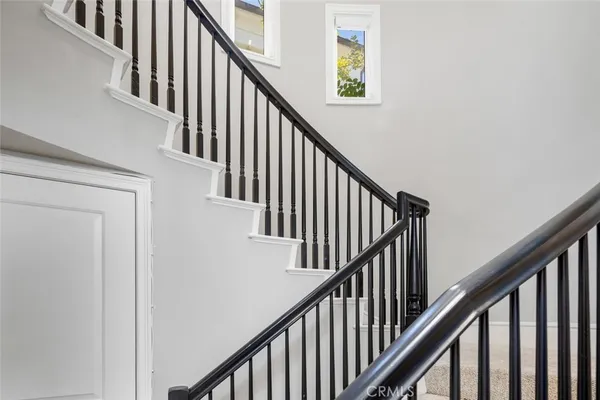 a white bath tub sitting in a bathroom