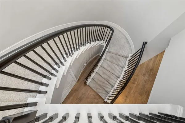 a view of a hallway with windows