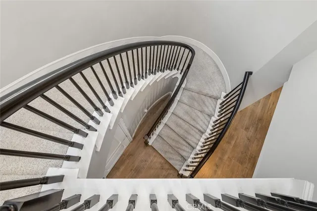 a view of a hallway with windows