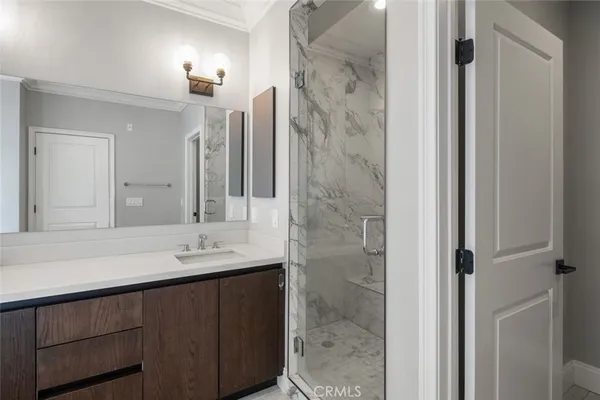 a utility room with sink dryer and washer