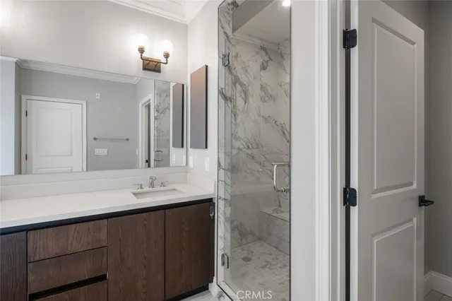 a utility room with sink dryer and washer