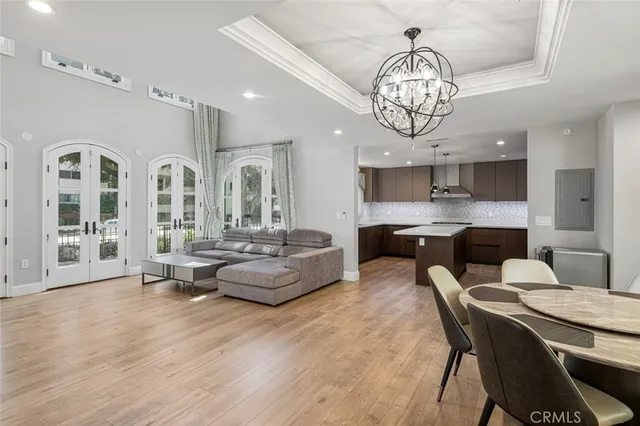 a living room with furniture and large window
