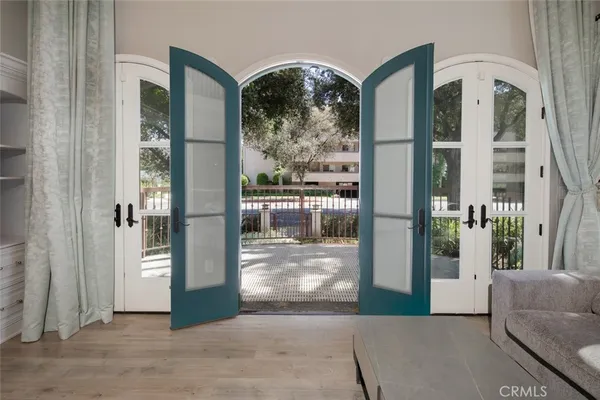a living room with furniture dining table and a fireplace