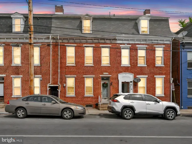 a car parked in front of a building