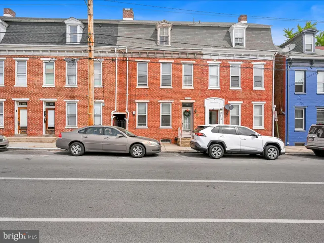 a car parked in front of a building