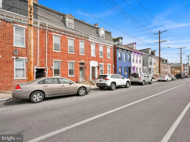 a car parked in front of a building