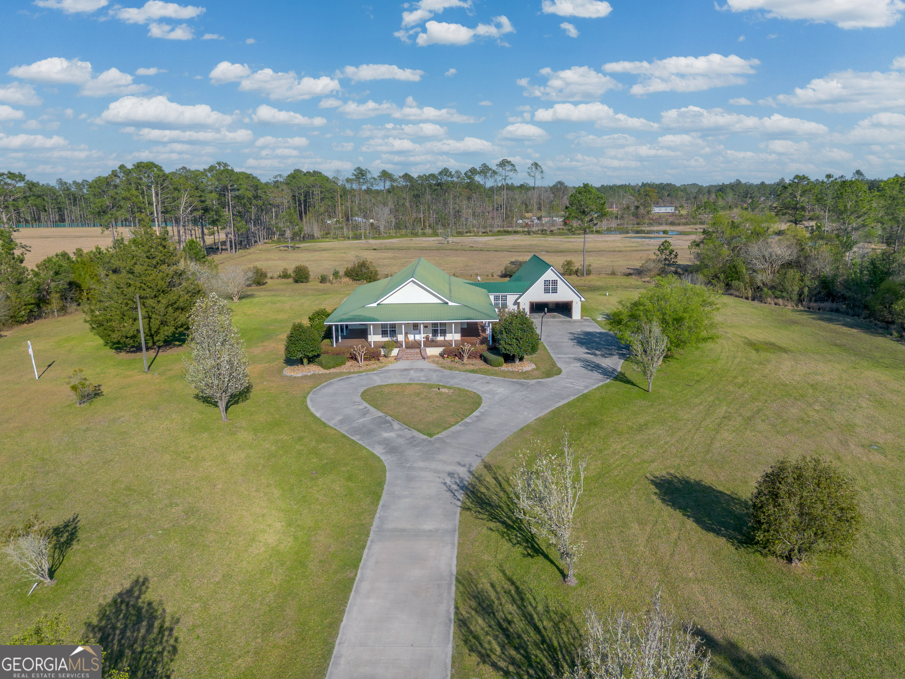 3300 Connor Lane Waycross, GA 31503 - Photo 5 of 42 a view of a lake with a mountain