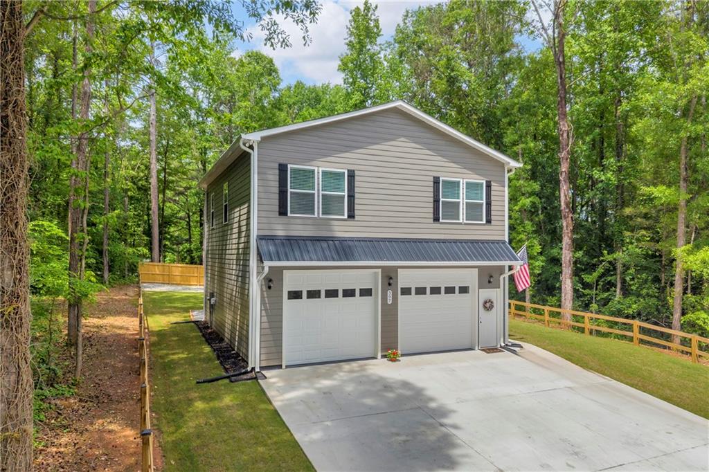 397 Normandy Trail Lavonia, GA 30553 - Photo 2 of 47 a view of a house with a yard