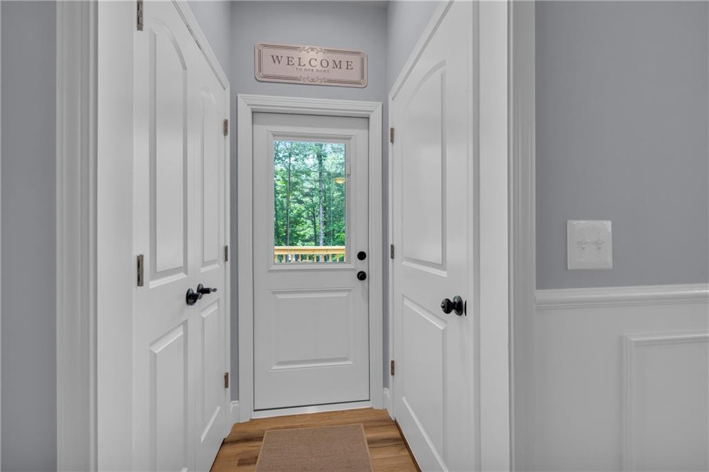 397 Normandy Trail Lavonia, GA 30553 - Photo 29 of 47 a view of a hallway with wooden floor