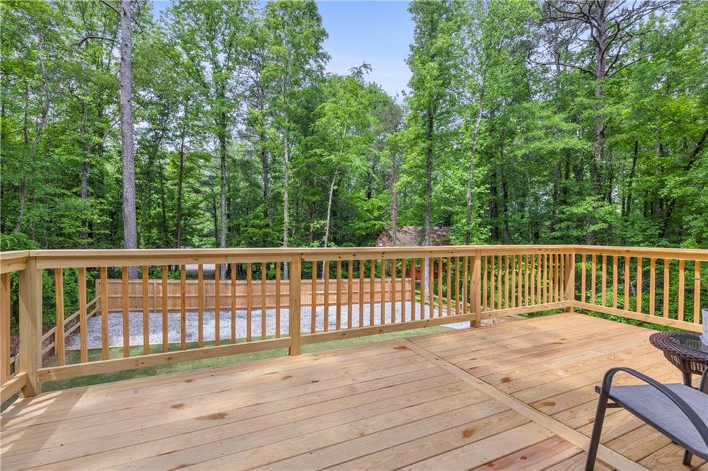 397 Normandy Trail Lavonia, GA 30553 - Photo 33 of 47 a view of a wooden roof deck