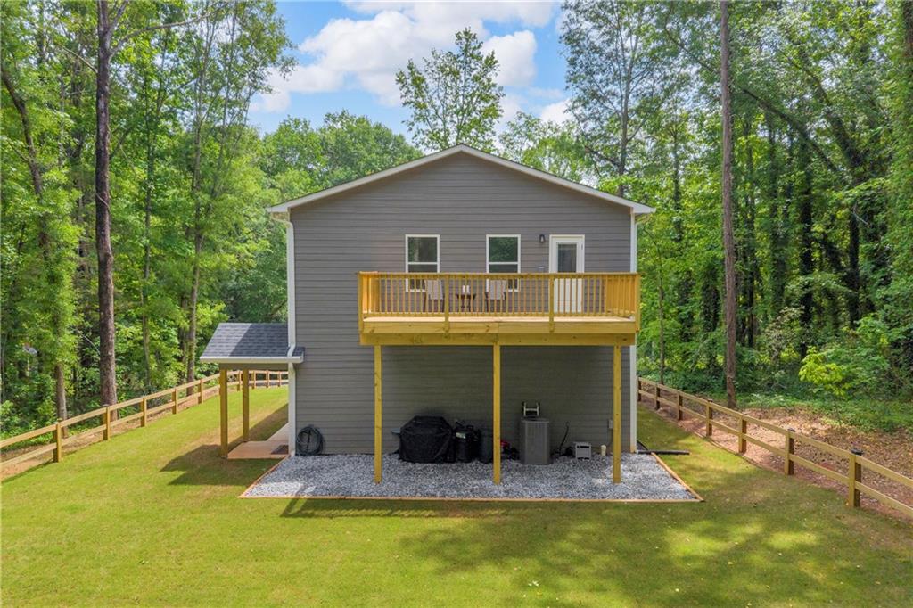 397 Normandy Trail Lavonia, GA 30553 - Photo 36 of 47 a view of house with outdoor seating area and furniture