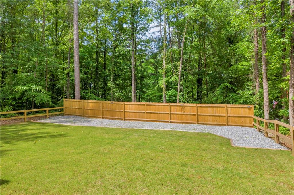 397 Normandy Trail Lavonia, GA 30553 - Photo 37 of 47 a view of a yard with large trees