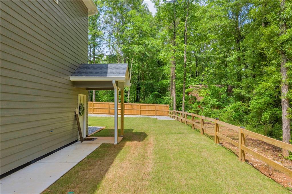 397 Normandy Trail Lavonia, GA 30553 - Photo 6 of 47 a view of a backyard