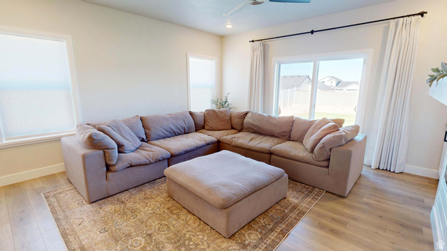 1127 4240 North Enoch, UT 84721 - Photo 16 of 56 Living area with light wood-type flooring and a ceiling fan