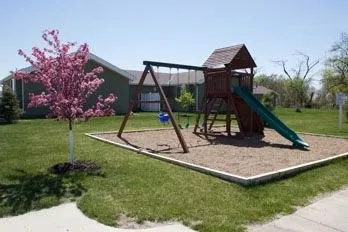 a view of a house with a park