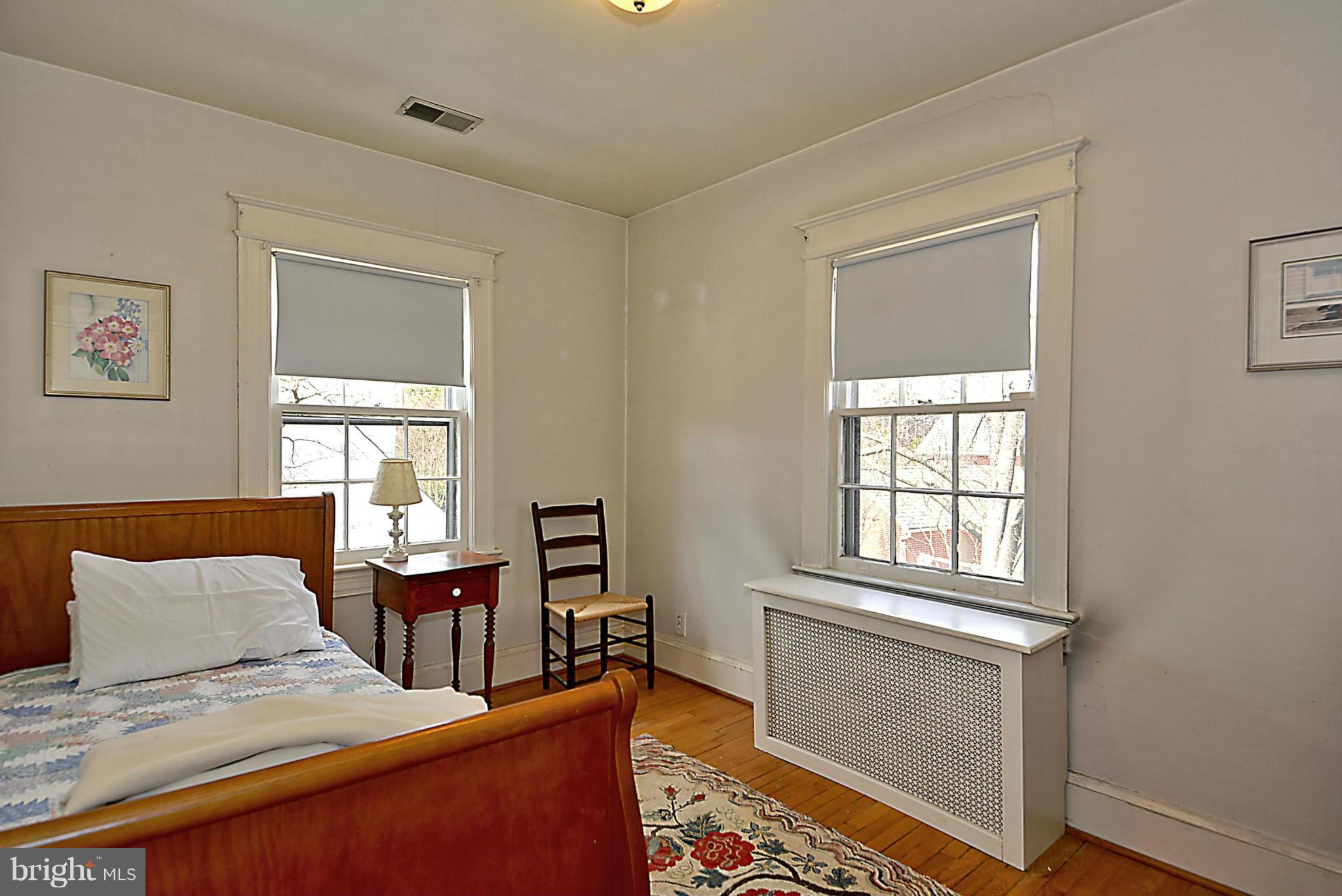 1909 Stratton Road Silver Spring, MD 20910 - Photo 14 of 22 a bedroom with furniture and a window