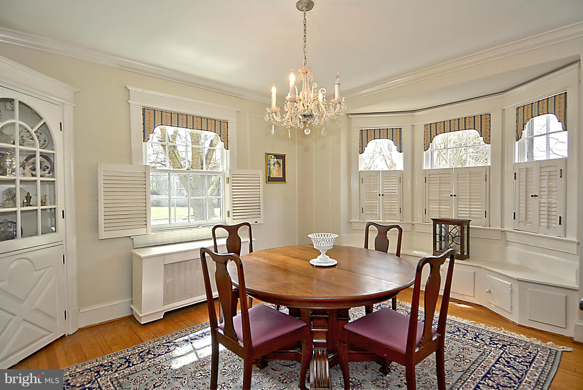 1909 Stratton Road Silver Spring, MD 20910 - Photo 8 of 22 a view of a dining room with furniture and window