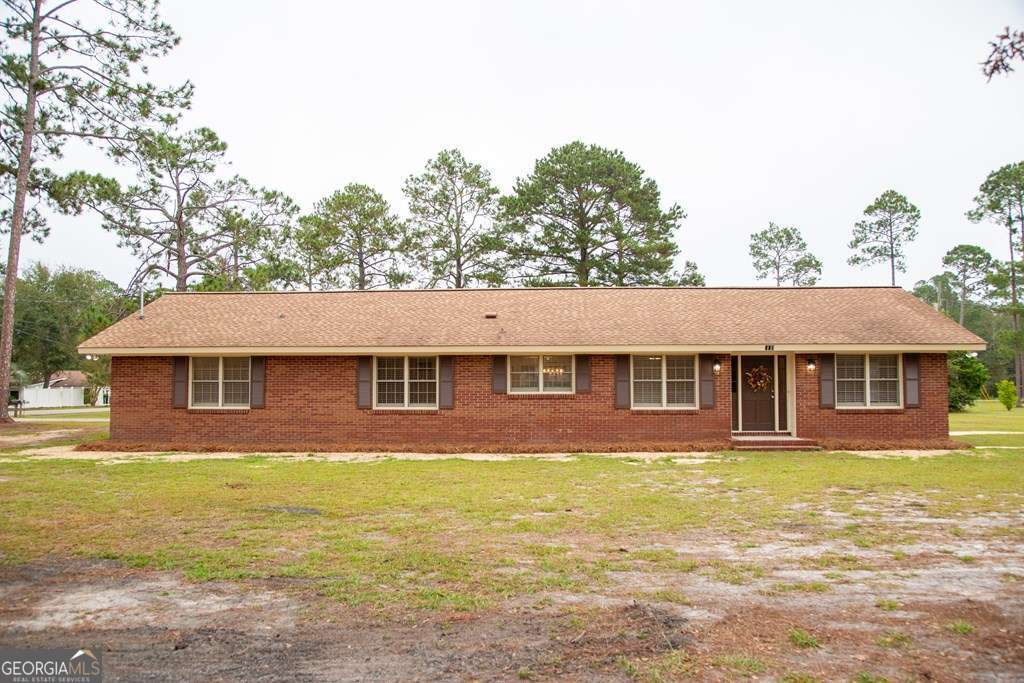 503 Satilla Church Road Baxley, GA 31513 - Photo 20 of 70 front view of house with a yard