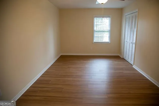 a view of an empty walk in closet
