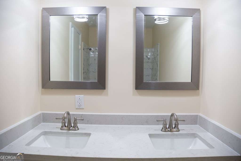 503 Satilla Church Road Baxley, GA 31513 - Photo 34 of 70 a bathroom with a sink and a mirror