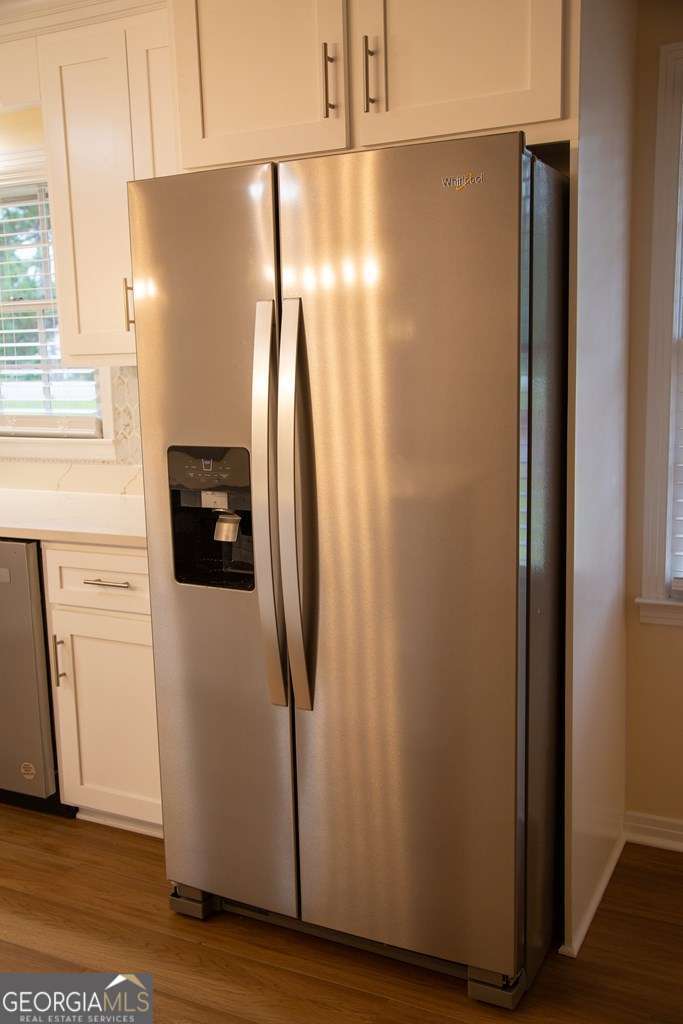 503 Satilla Church Road Baxley, GA 31513 - Photo 48 of 70 a white refrigerator freezer sitting in a kitchen