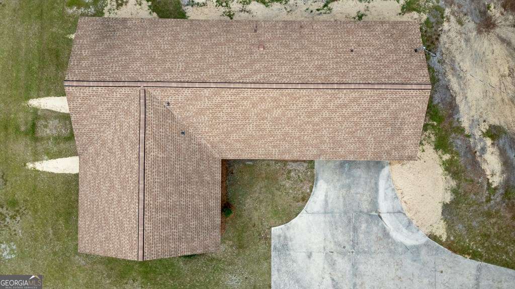 503 Satilla Church Road Baxley, GA 31513 - Photo 69 of 70 an aerial view of a house with a yard and large tree